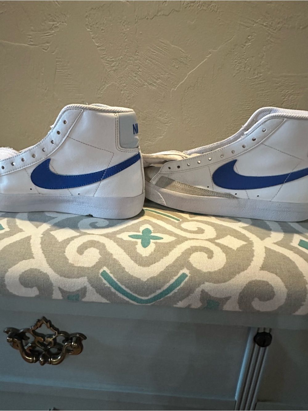 Nike Men’s White High-Top Sneakers with Blue Swoosh